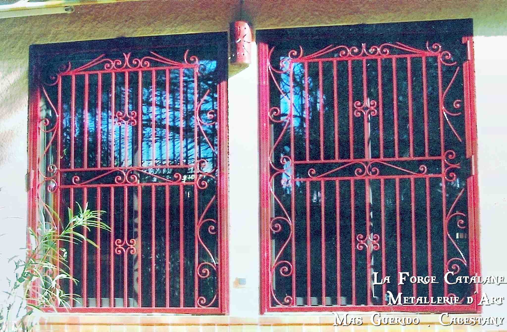 grille articulee simple double frise volutes forge catalane.jpg